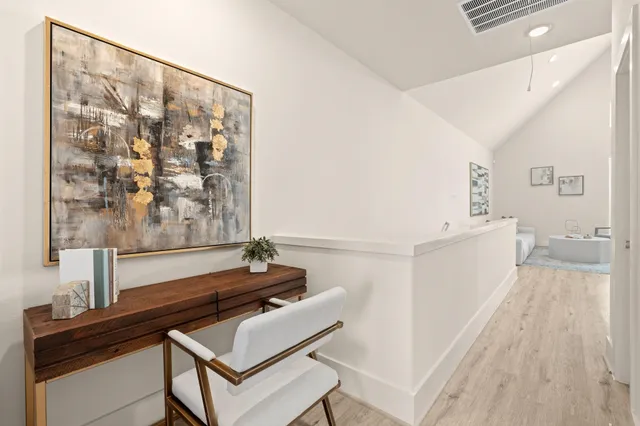 a bedroom with a bed and a couch