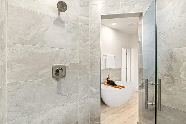 a bathroom with a sink and shower