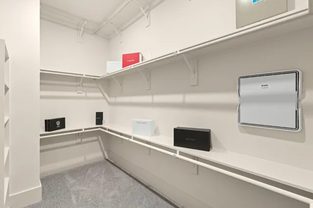 a view of a balcony with wooden floor