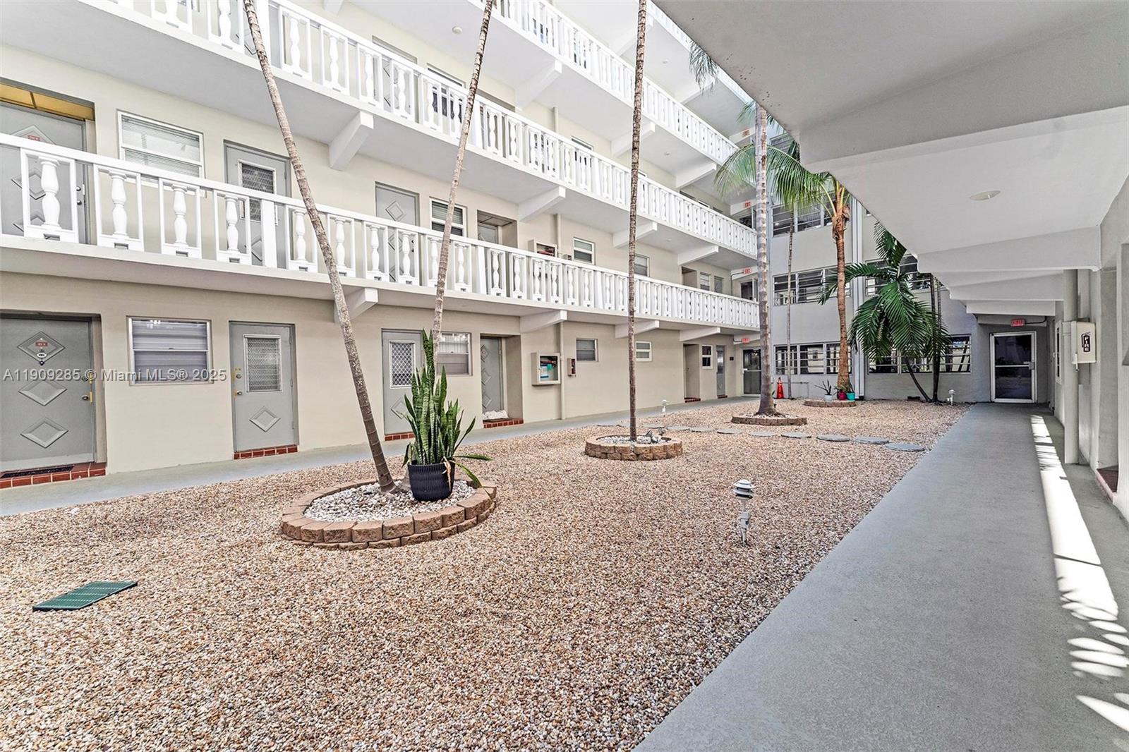 330 Southeast 2nd Street, Unit 103G Hallandale Beach, FL 33009 - Photo 29 of 37 a view of a building with a street