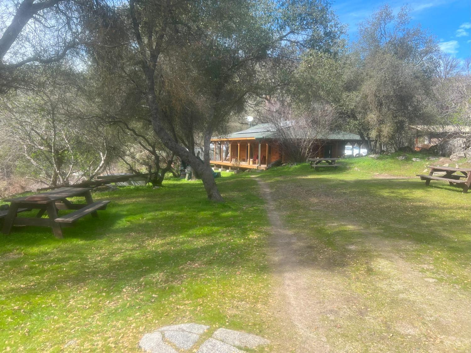 140040 Vincent Fire Road Tollhouse, CA 93667 - Photo 9 of 30 a view of a house with a backyard