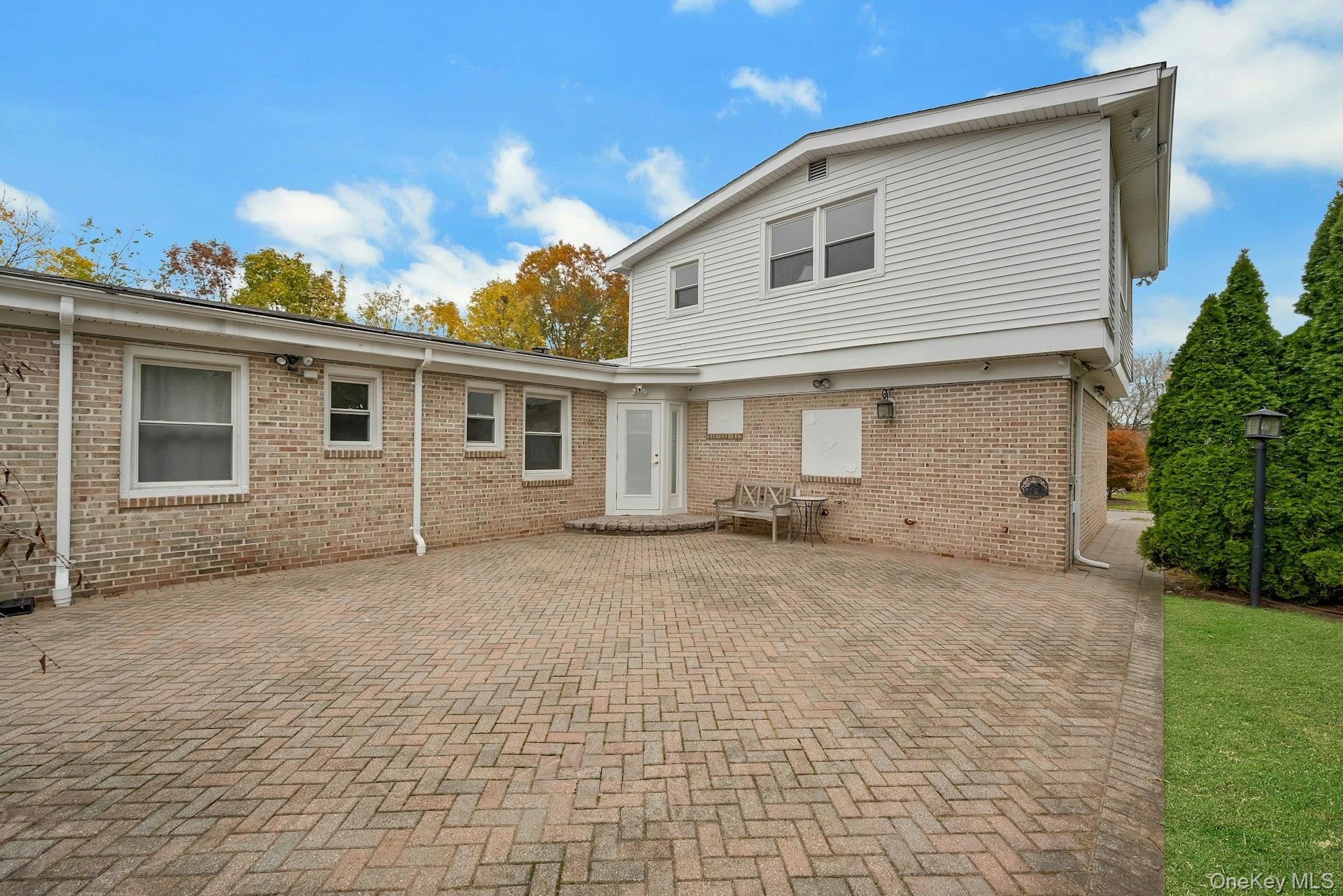 1 Echo Bay Place New Rochelle, NY 10805 - Photo 16 of 47 a view of a house with a patio