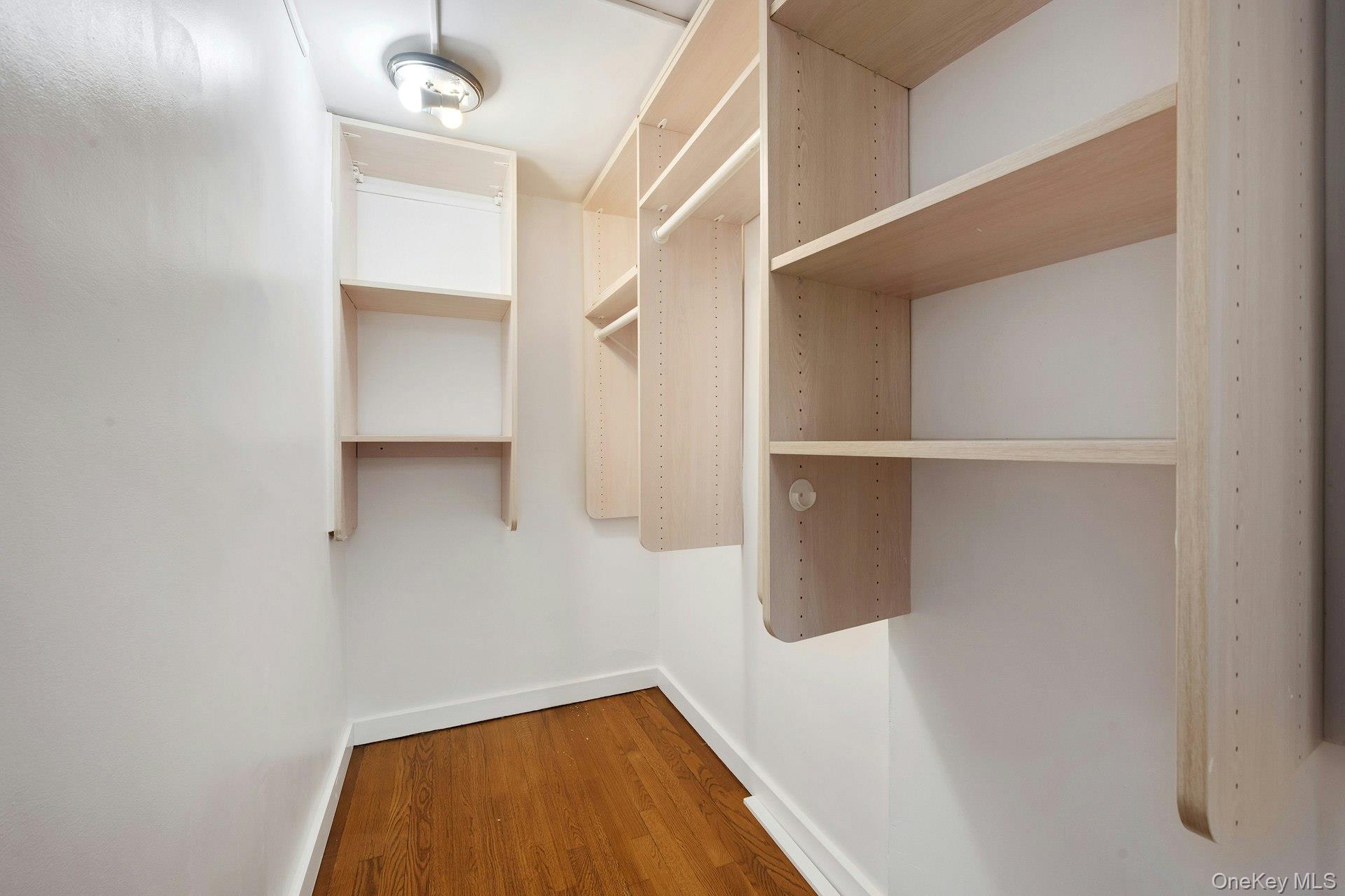1 Echo Bay Place New Rochelle, NY 10805 - Photo 19 of 47 a view of walk in closet with empty racks