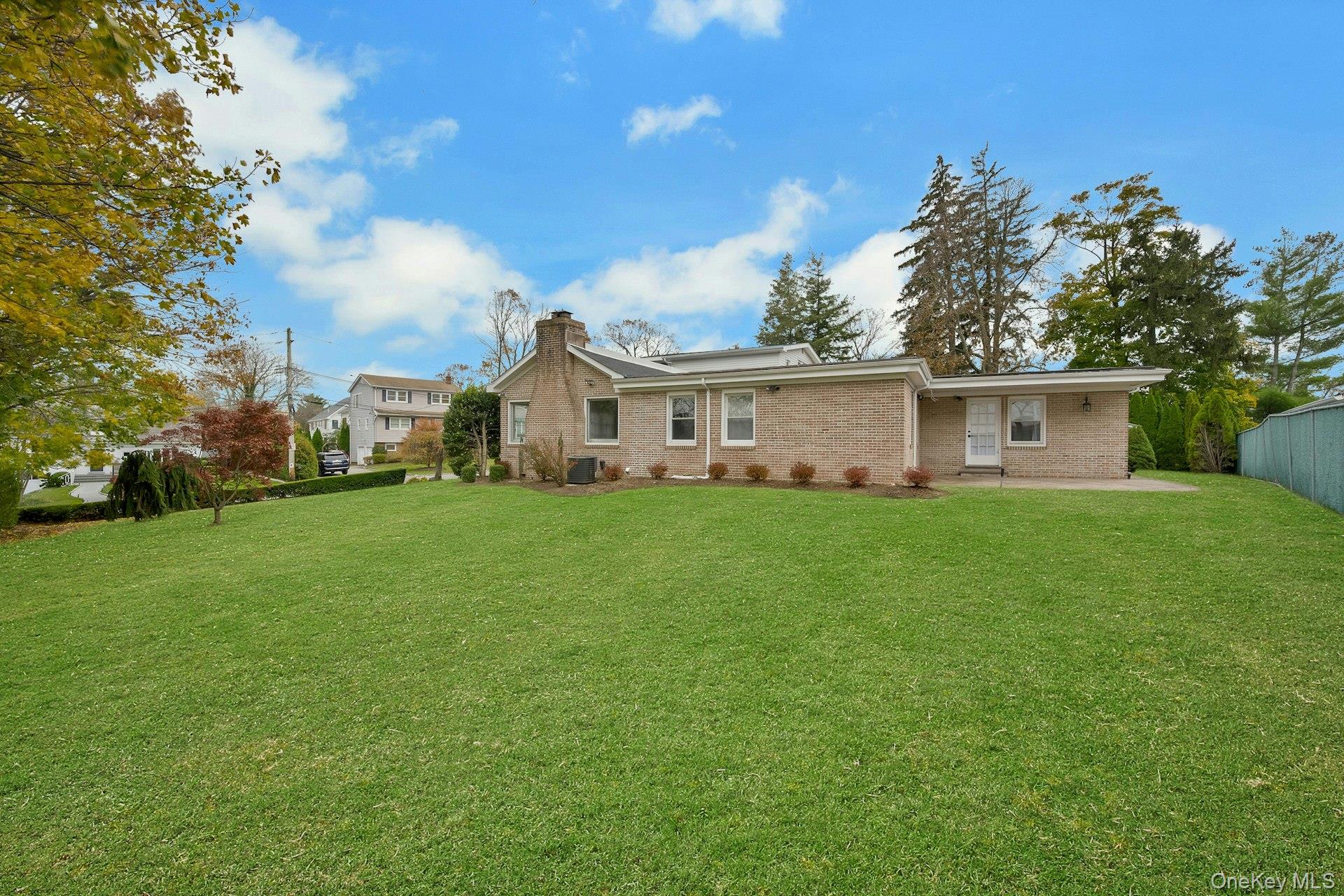 1 Echo Bay Place New Rochelle, NY 10805 - Photo 33 of 47 a view of house that has garden