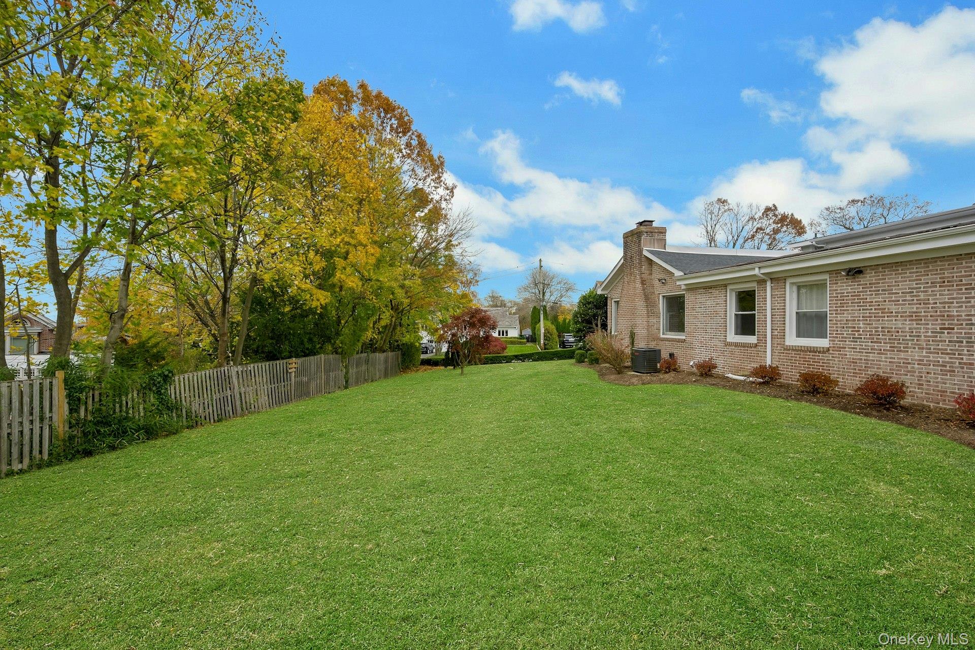 1 Echo Bay Place New Rochelle, NY 10805 - Photo 39 of 47 a view of a house with a backyard