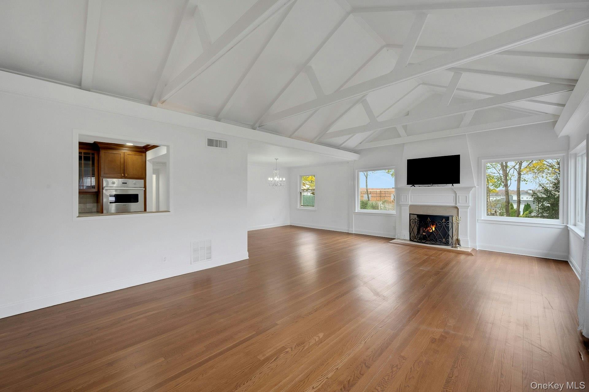 1 Echo Bay Place New Rochelle, NY 10805 - Photo 8 of 47 a view of a livingroom with a fireplace a window and a fireplace