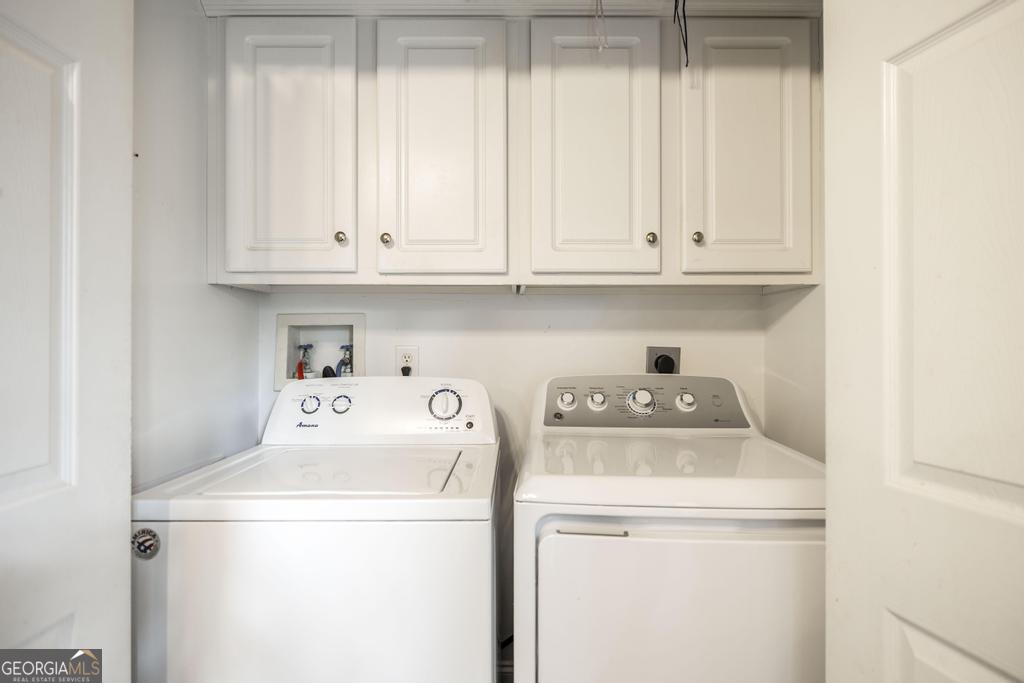 1066 Alma Drive Macon, GA 31216 - Photo 11 of 18 a utility room with dryer and washer