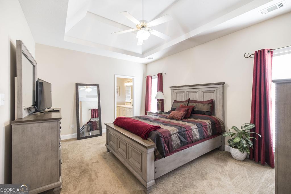 1066 Alma Drive Macon, GA 31216 - Photo 12 of 18 a bed room with a bed and a television