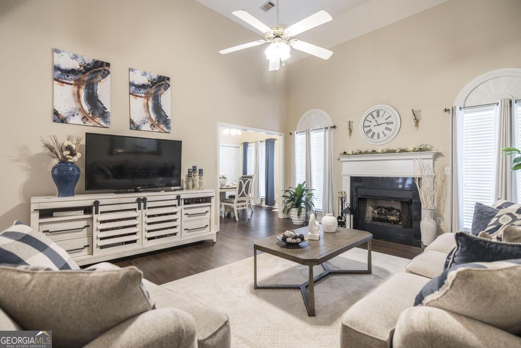 1066 Alma Drive Macon, GA 31216 - Photo 6 of 18 a living room with furniture and a fireplace