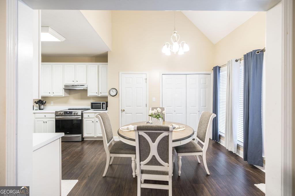 1066 Alma Drive Macon, GA 31216 - Photo 10 of 18 a view of a dining room with furniture and wooden floor