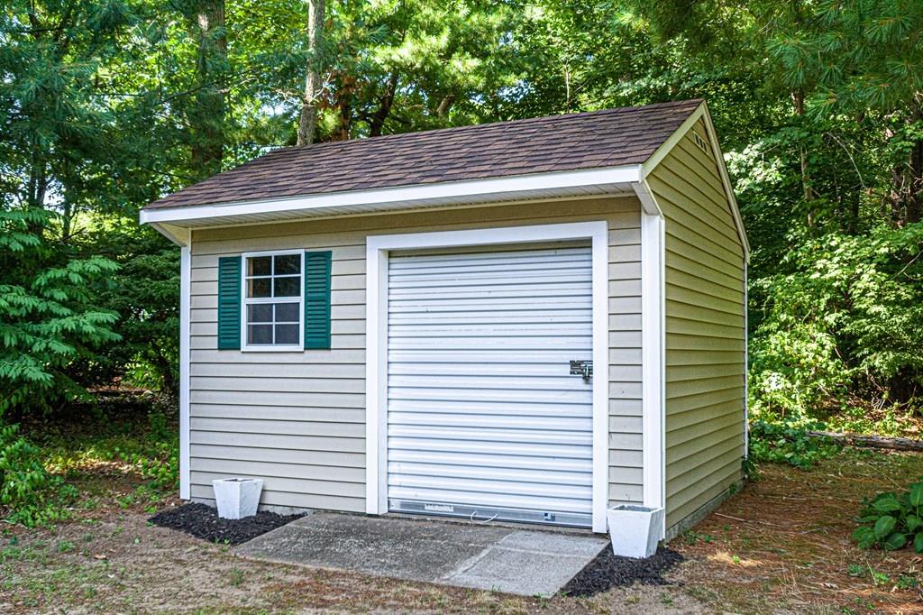 31 Woodland Road Billerica, MA 01821 - Photo 38 of 39 a view of house with backyard