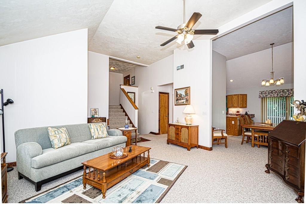 31 Woodland Road Billerica, MA 01821 - Photo 7 of 39 a living room with furniture and wooden floor