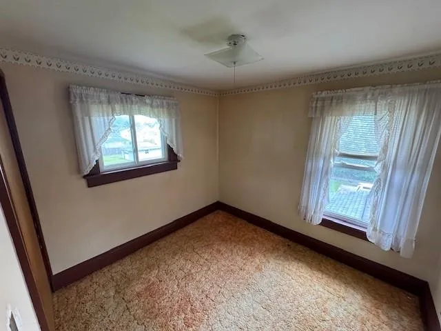 an empty room with a window