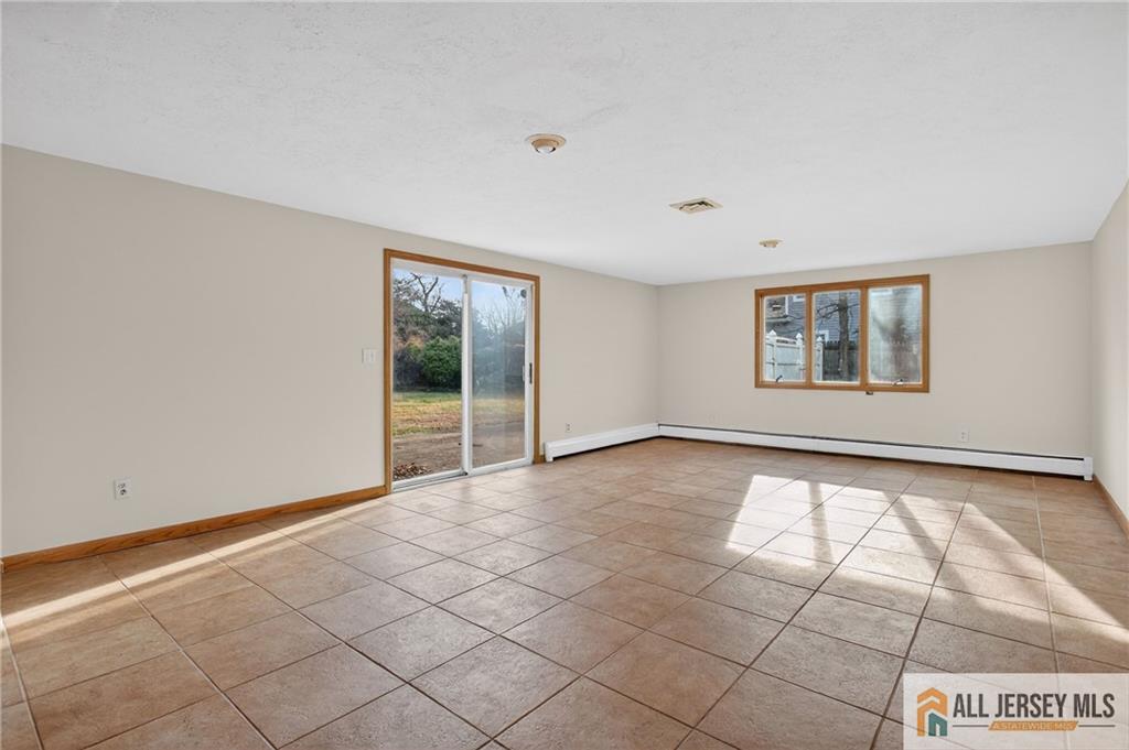 352 Rahway Road Edison, NJ 08820 - Photo 13 of 30 a view of an empty room with a window