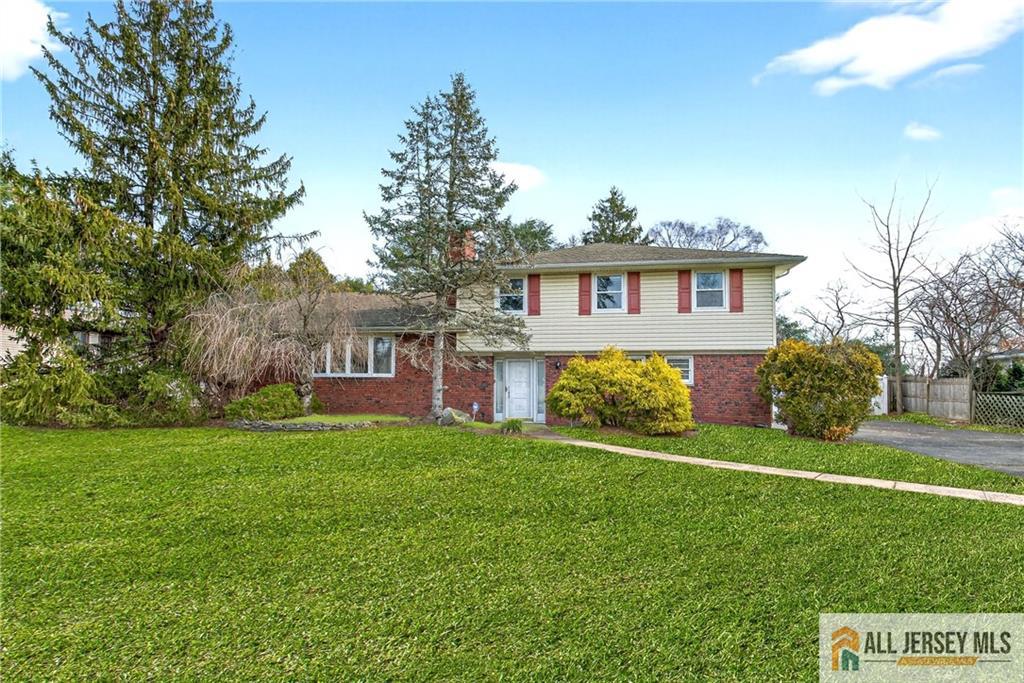352 Rahway Road Edison, NJ 08820 - Photo 2 of 30 a front view of house with yard and green space