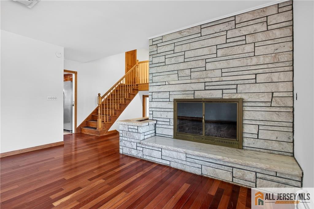 352 Rahway Road Edison, NJ 08820 - Photo 7 of 30 a view of entryway and hall with wooden floor