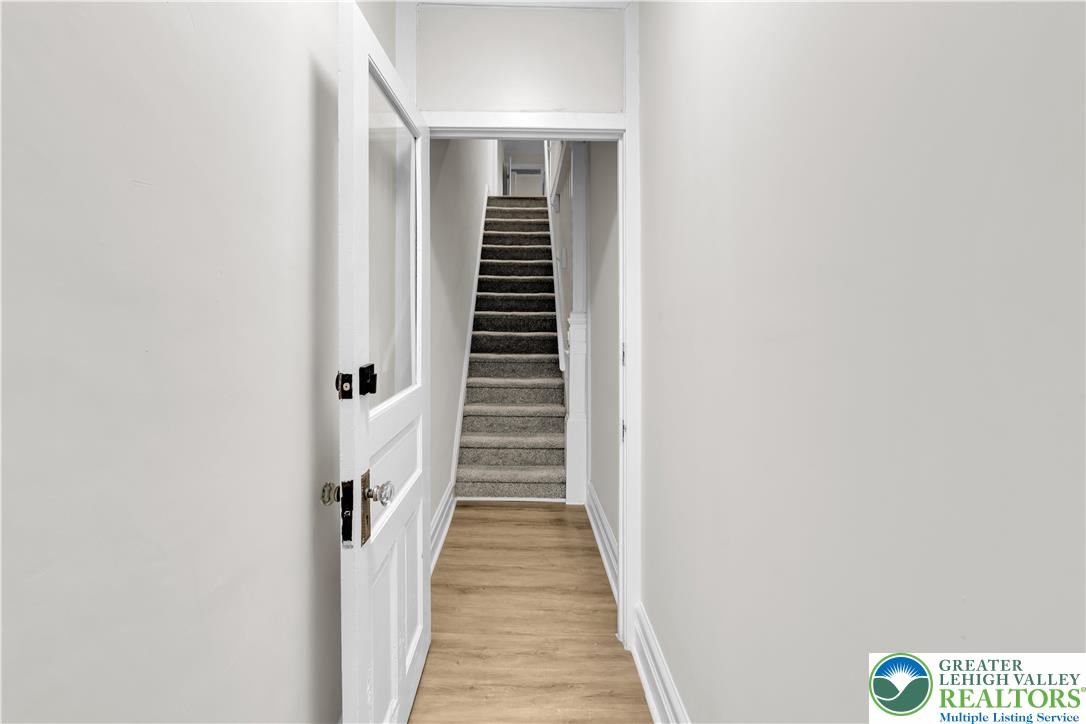 109 North Sixth Street Emmaus, PA 18049 - Photo 2 of 23 a view of a hallway with wooden floor and entryway