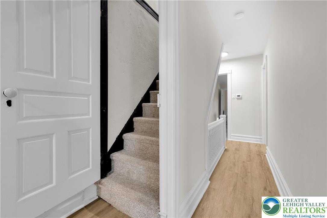109 North Sixth Street Emmaus, PA 18049 - Photo 7 of 23 a view of a hallway with wooden floor and entryway