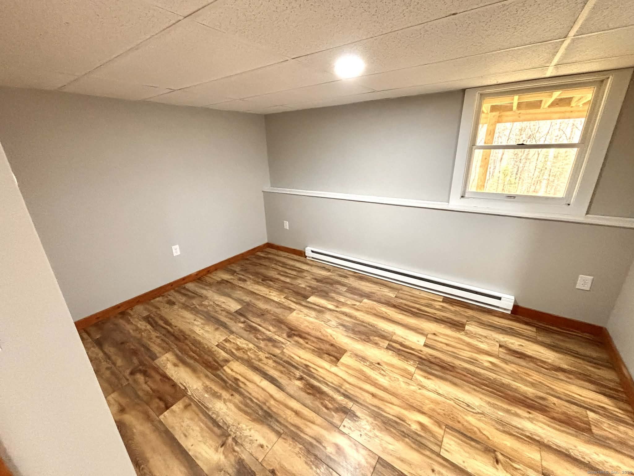 164 Starkweather Road Plainfield, CT 06354 - Photo 20 of 23 a view of empty room with wooden floor
