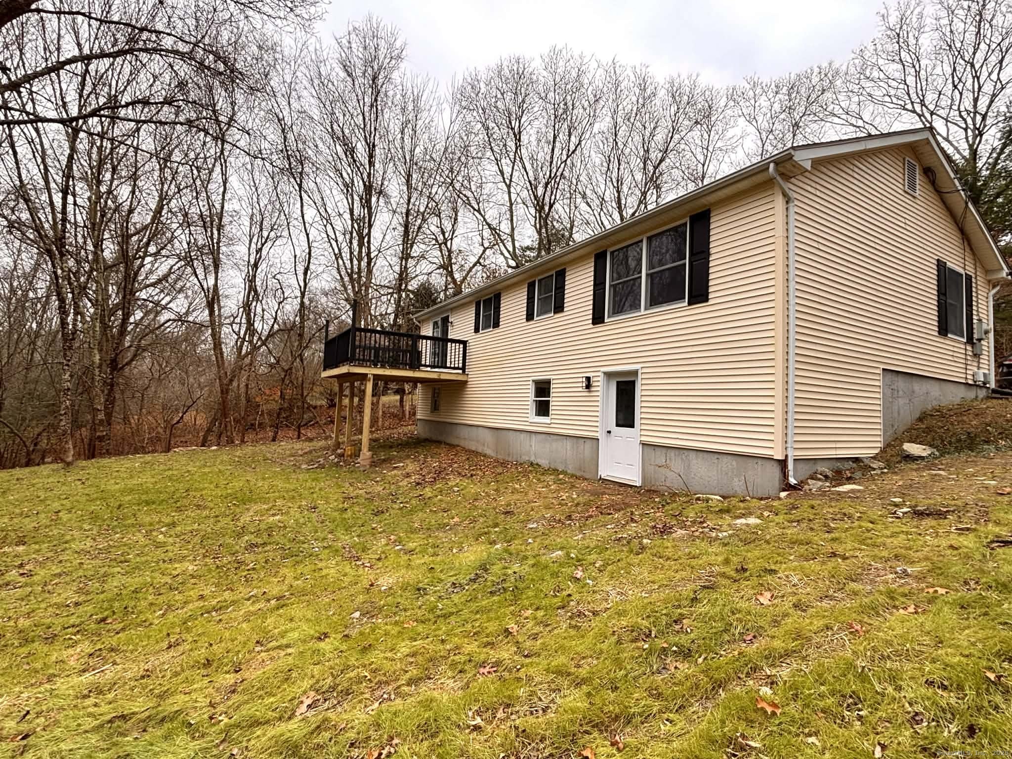 164 Starkweather Road Plainfield, CT 06354 - Photo 3 of 23 a white house that has a tree in front of it