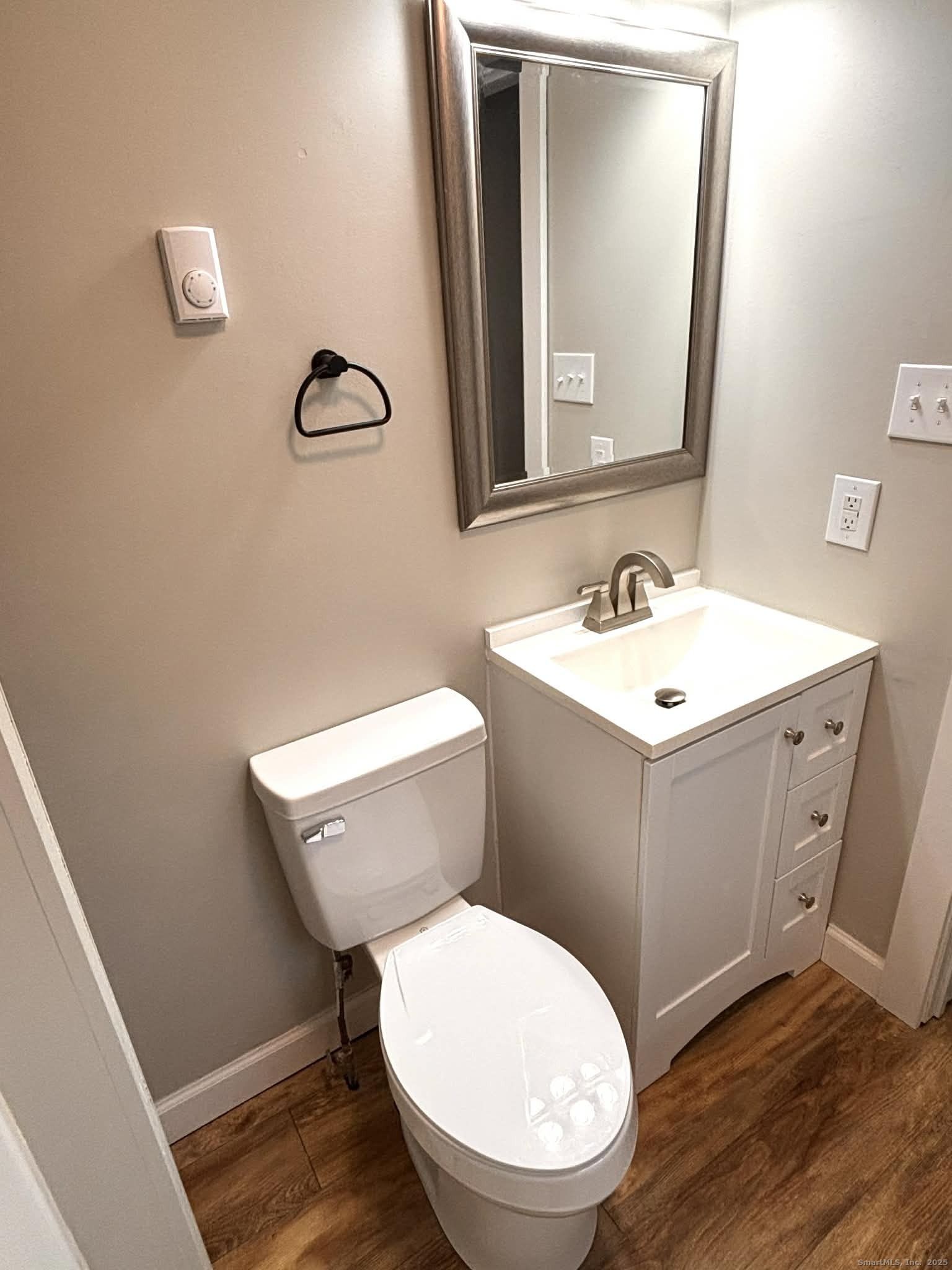 164 Starkweather Road Plainfield, CT 06354 - Photo 10 of 23 a bathroom with a toilet a sink and mirror