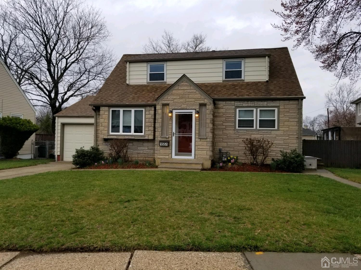 1551 Barton Road Union, NJ 07083 - Photo 1 of 7 a front view of a house with a yard