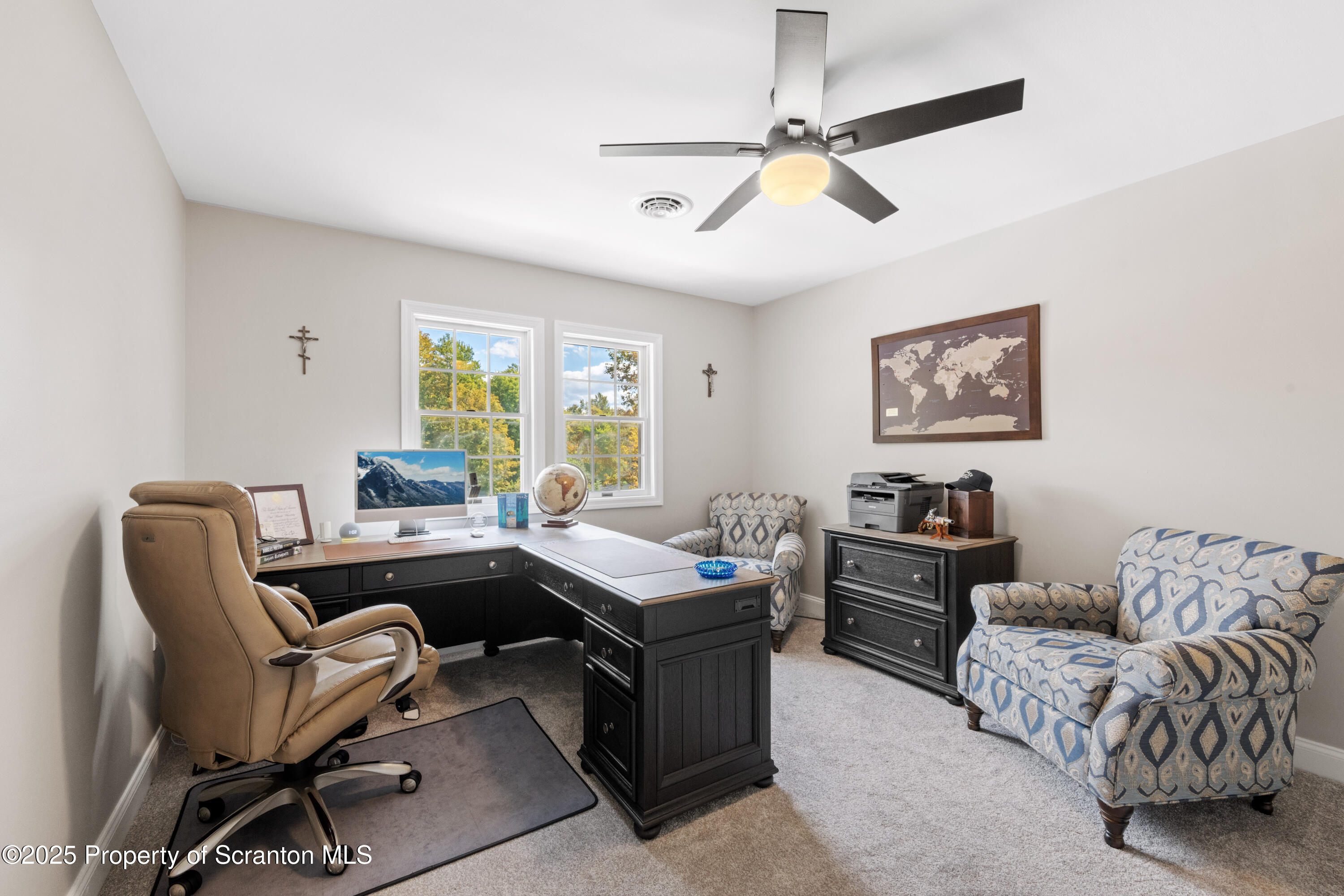 220 Fuller Road Dalton, PA 18414 - Photo 17 of 55 a view of a workspace with furniture and a window