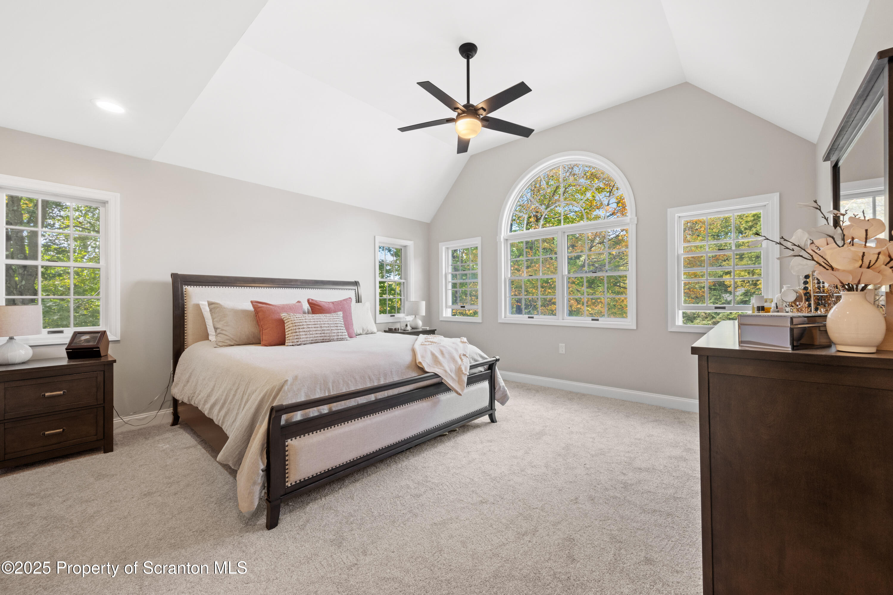 220 Fuller Road Dalton, PA 18414 - Photo 20 of 55 a bedroom with a large bed and a large window