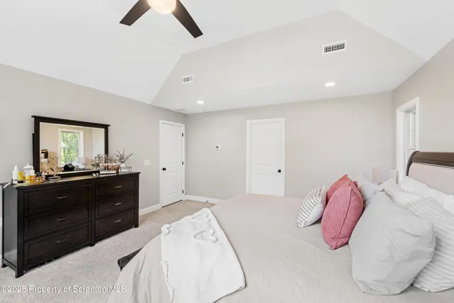 a spacious bathroom with a sink and a bathtub