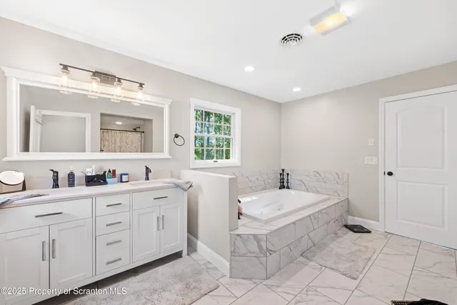 a view of a garage with a flat screen tv