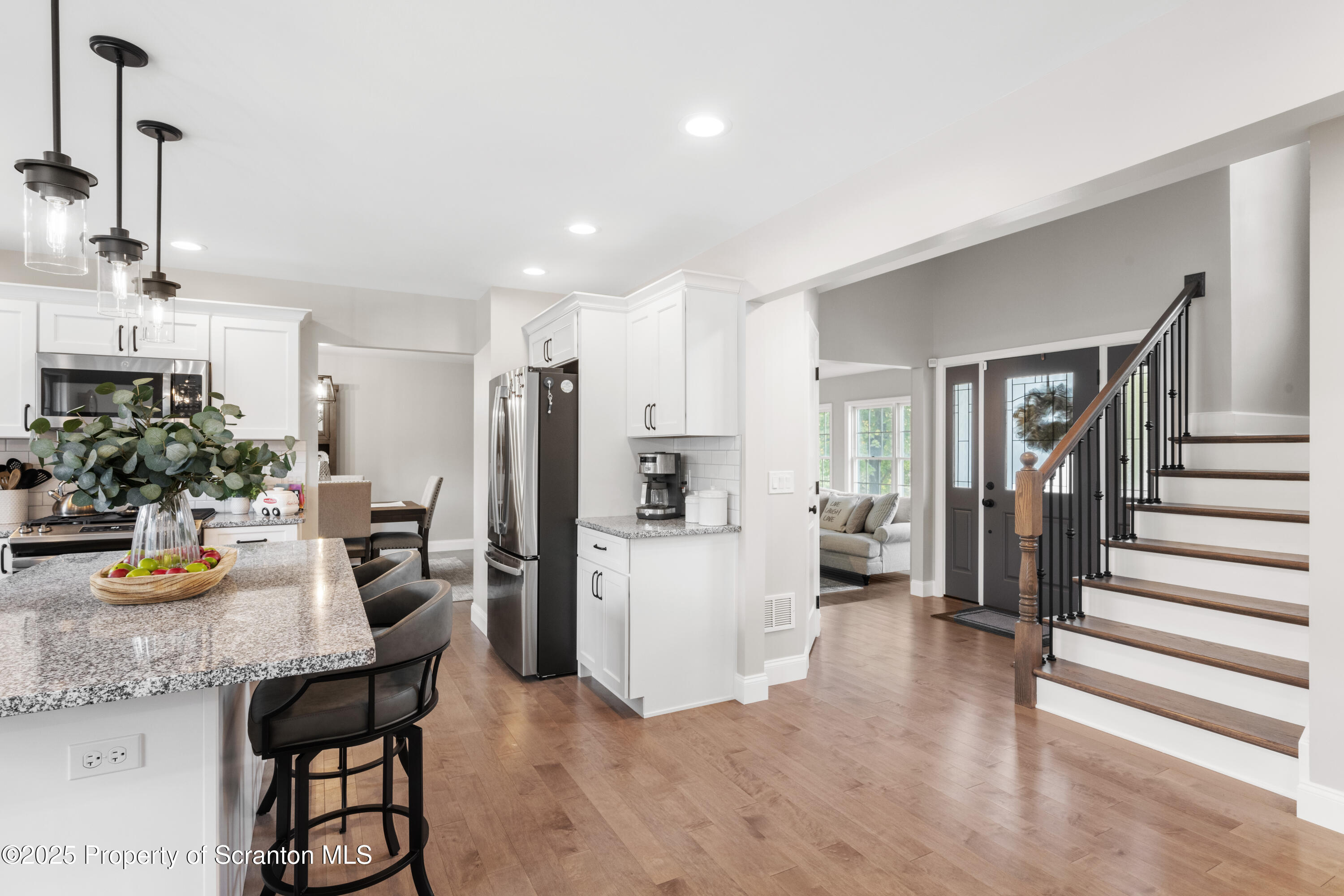 220 Fuller Road Dalton, PA 18414 - Photo 35 of 55 a kitchen with refrigerator and chairs