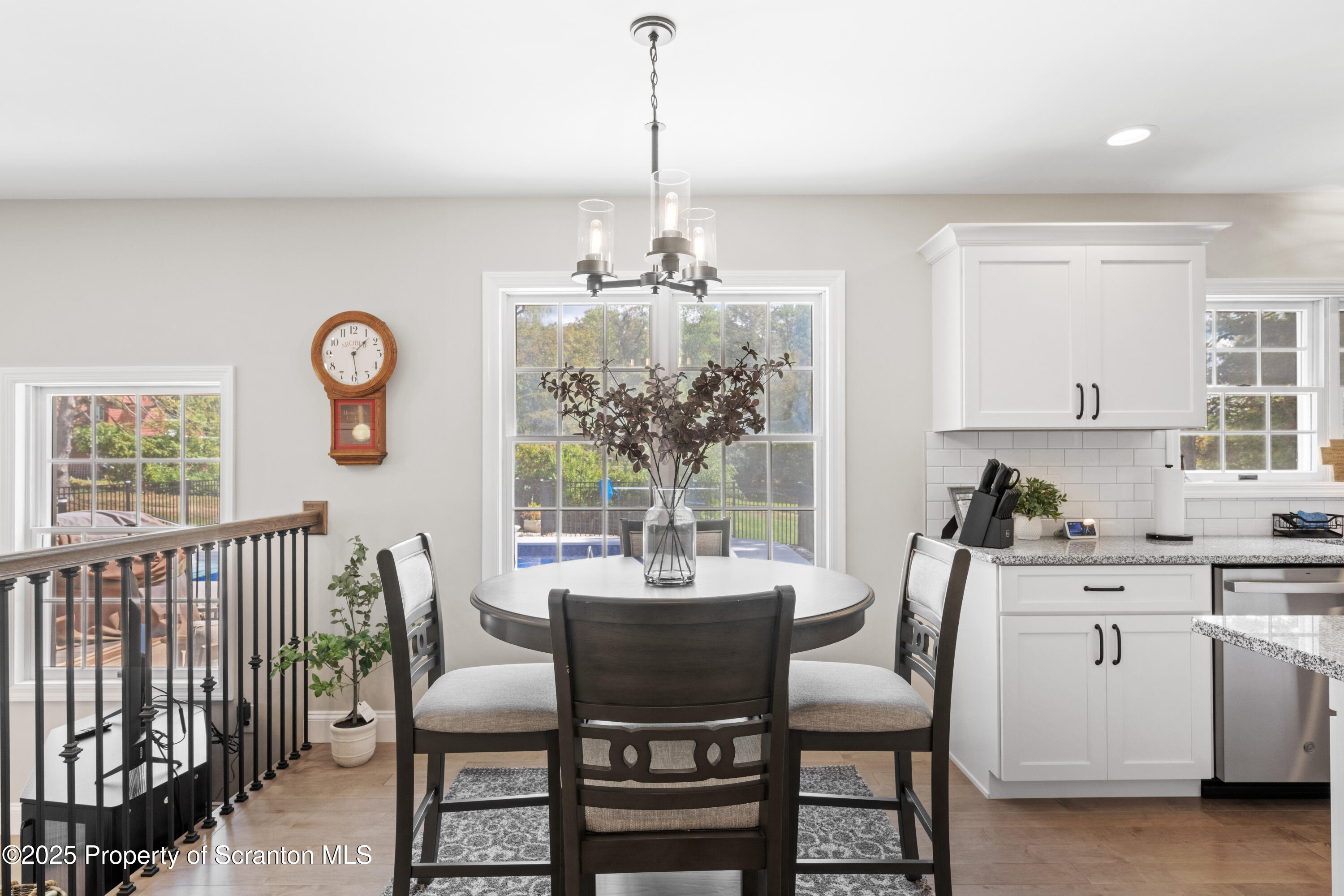 220 Fuller Road Dalton, PA 18414 - Photo 37 of 55 a dining room with furniture a chandelier and window