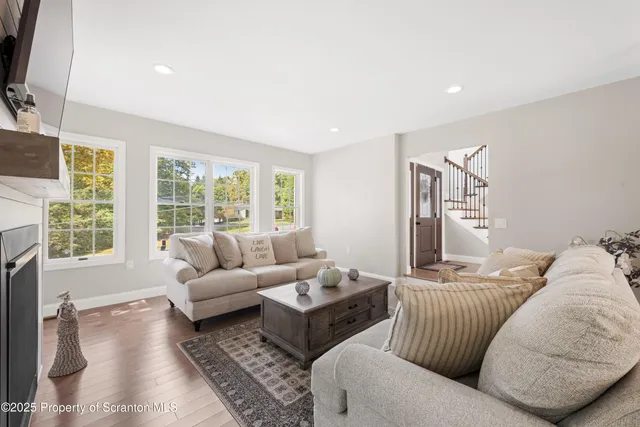 a view of storage and utility room with a window
