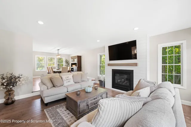 a view of a storage room with a table and chairs