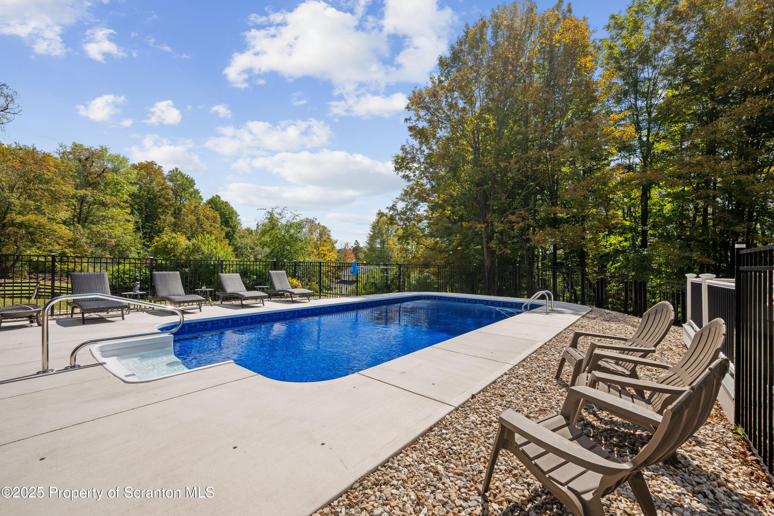 220 Fuller Road Dalton, PA 18414 - Photo 54 of 55 a view of a swimming pool with a patio