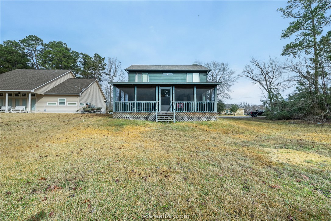 70 Lakeside Drive Trinity, TX 75862 - Photo 8 of 34 a view of a house with a yard