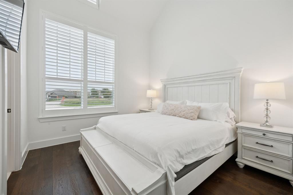7024 Prairie Ridge Road Argyle, TX 76226 - Photo 26 of 40 Secondary Bedrooms Feature Beautiful Wood Floors and Spacious Walk-In Closets