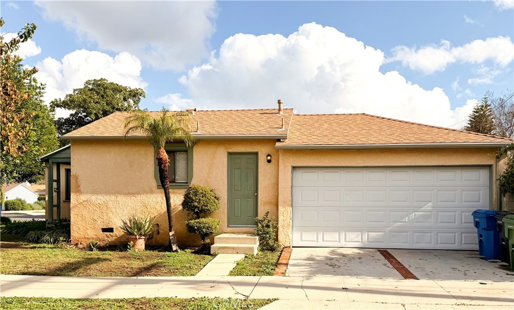18424 Calvert Street Tarzana, CA 91335 - Photo 16 of 25 a view of a house with small yard