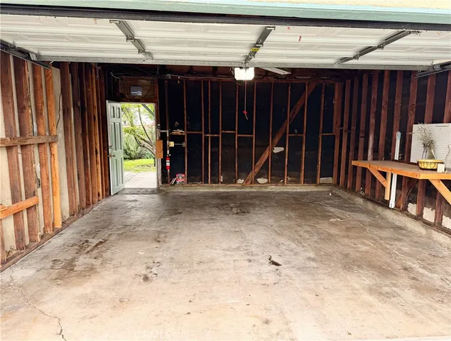 a view of a backyard of the house