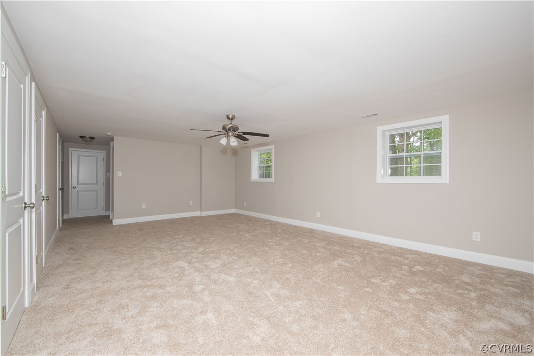 4352 Three Bridge Road Powhatan, VA 23139 - Photo 18 of 30 Large living room with new carpet and ceiling fan