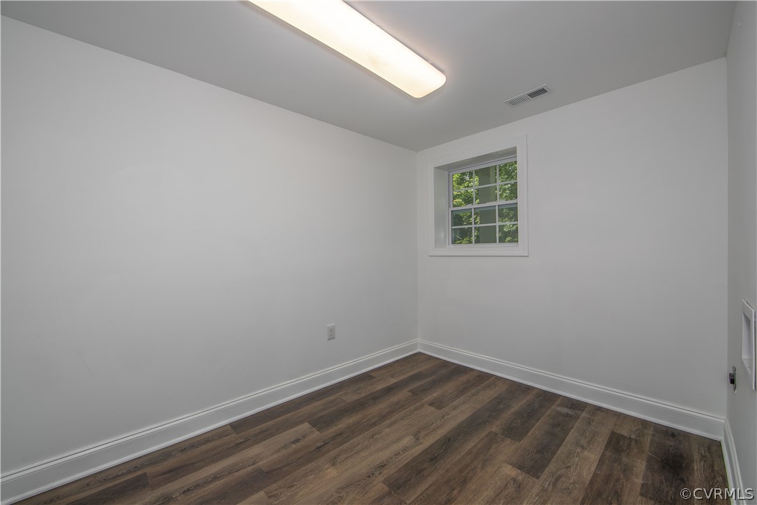 4352 Three Bridge Road Powhatan, VA 23139 - Photo 25 of 30 Laundry with beautiful new laminate flooring