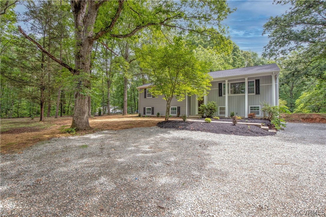 4352 Three Bridge Road Powhatan, VA 23139 - Photo 26 of 30 The front yard offers beautiful established trees,