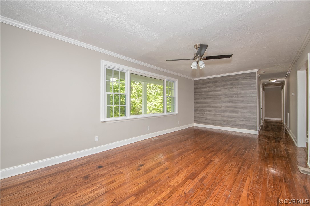 4352 Three Bridge Road Powhatan, VA 23139 - Photo 9 of 30 Huge window and beautiful accent wall add charm to