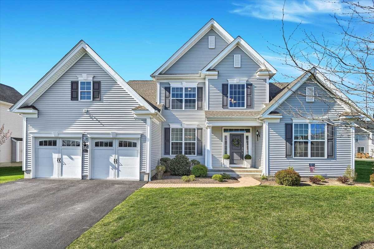41 Pitcher Road East Fishkill, NY 12533 - Photo 1 of 35 a front view of a house with a yard