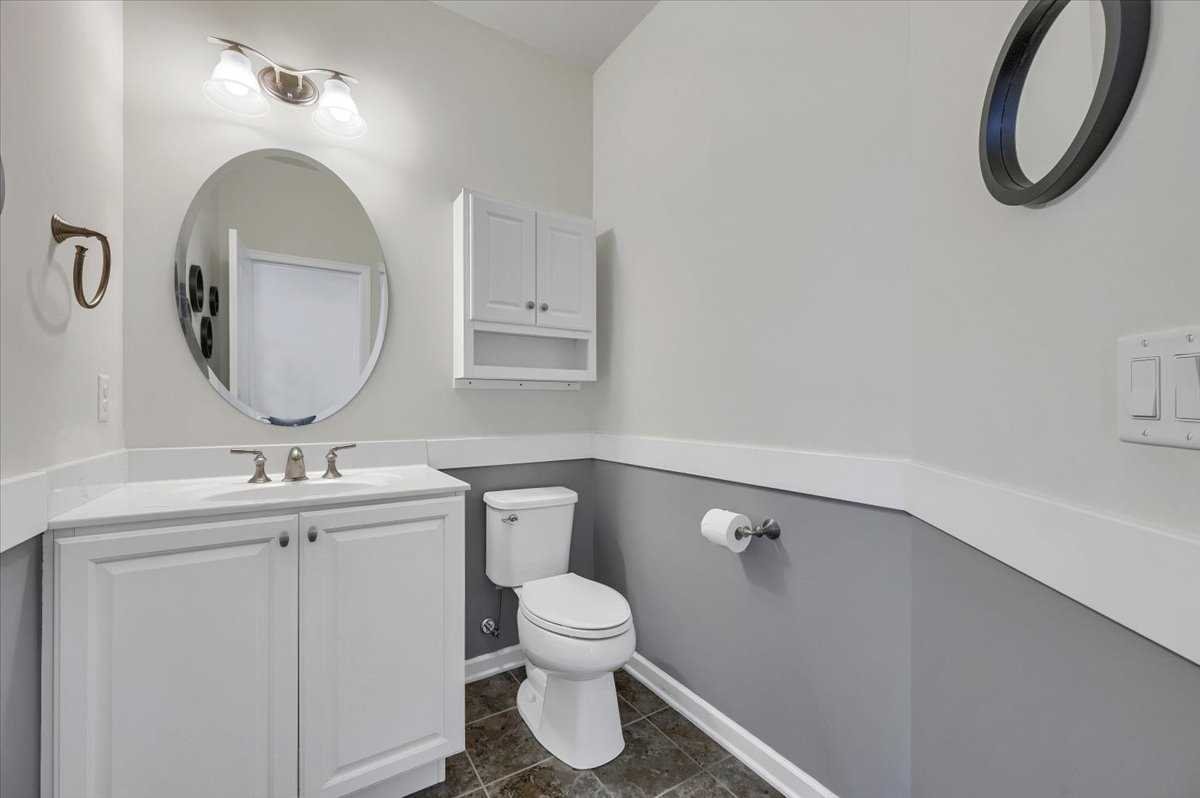 41 Pitcher Road East Fishkill, NY 12533 - Photo 14 of 35 a bathroom with a toilet sink and mirror