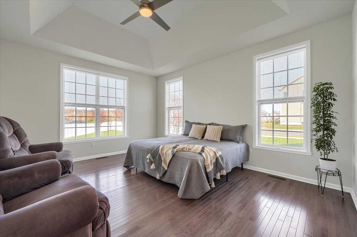 41 Pitcher Road East Fishkill, NY 12533 - Photo 15 of 35 a bed room with a bed and a couch