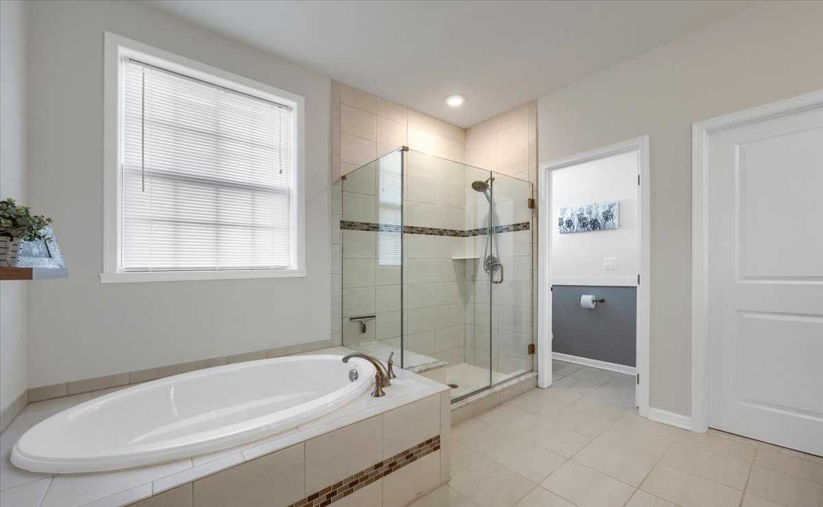41 Pitcher Road East Fishkill, NY 12533 - Photo 17 of 35 a bathroom with a tub and a shower