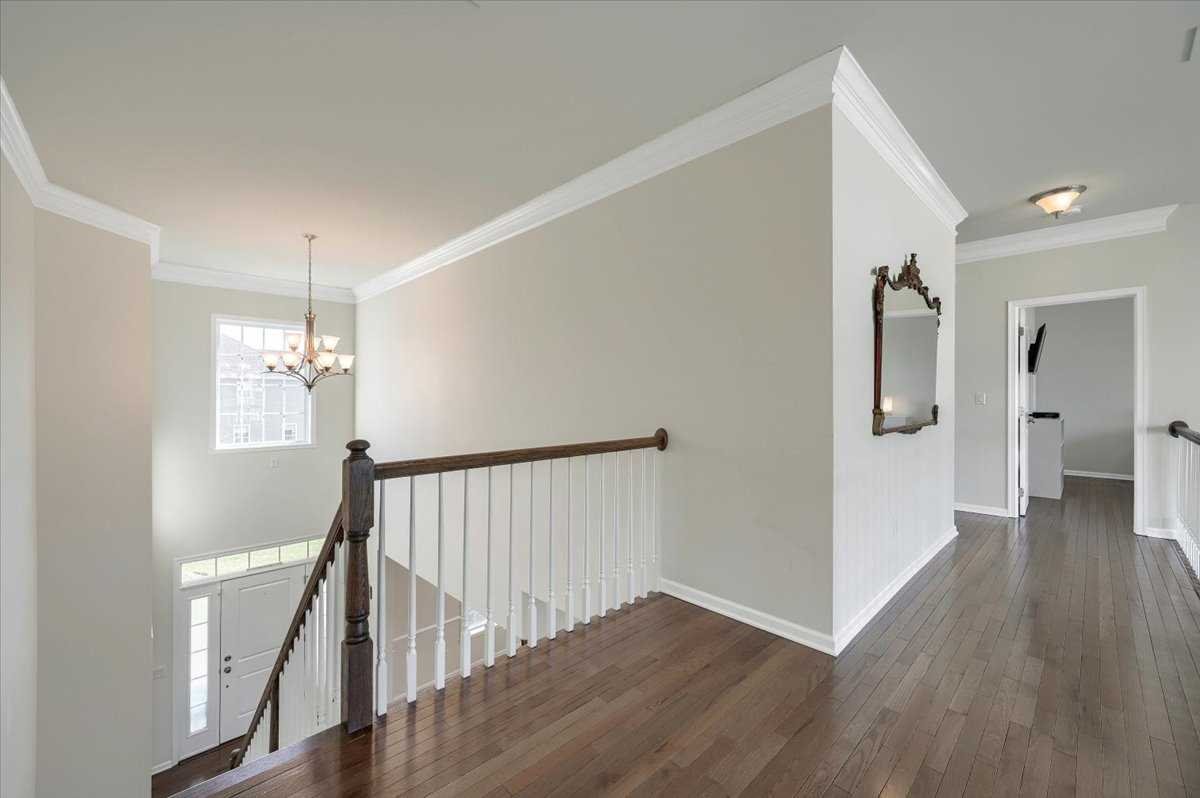 41 Pitcher Road East Fishkill, NY 12533 - Photo 20 of 35 a view of a hallway with wooden floor and stairs