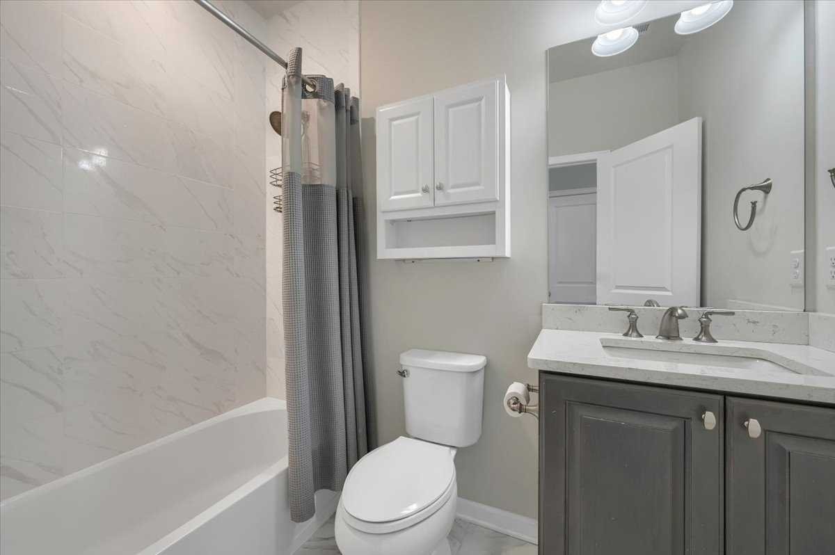 41 Pitcher Road East Fishkill, NY 12533 - Photo 23 of 35 a bathroom with a granite countertop sink toilet and shower
