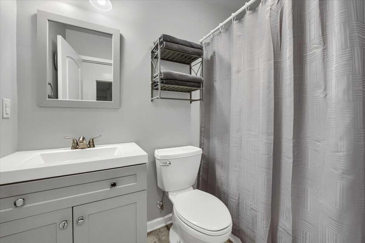 41 Pitcher Road East Fishkill, NY 12533 - Photo 26 of 35 a bathroom with a toilet a sink and mirror